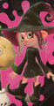 Octoling girl wearing the Enchanted Set as seen on the Octoling amiibo's packaging.