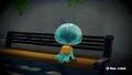 A jellyfish on a bench.