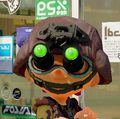 Closeup of another male Inkling wearing the Stealth Goggles.