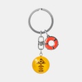 A keychain of a Golden Egg and a Lifesaver.