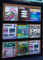 Magazines at Ancho-V Games - the top one may be a reference to the Squid Sisters' outfits.