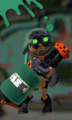 A female Inkling wearing the Stealth Goggles, hugging a Heavy Splatling.
