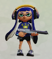 A female Inkling wearing the Designer Headphones, holding an N-ZAP '85.