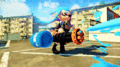Animated GIF of an Inkling firing a Heavy Splatling in Flounder Heights.