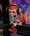 A female Inkling wearing the Red Work Boots.