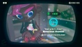 Agent 8 being awarded the Octobomber mem cake upon completing the station.