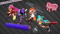 An Inkling (far left) wearing the Yellow FishFry Sandals, holding the Custom Dualie Squelchers.