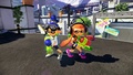 A promo image of two Inklings, with Urchin Underpass shown in the background.