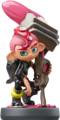 The Octoling Boy amiibo shows an Octoling Boy, posing with the Octobrush