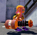 Another female Inkling wearing the Orange Cardigan, holding a Heavy Splatling Deco.