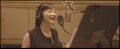 Anna Sato recording the song