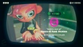 Agent 8 being awarded the Curling Bomb mem cake upon completing the station.