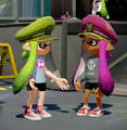 A pair of Inkling girls wearing the Legendary Cap.