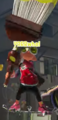 An Octoling holding the Octobrush.