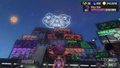 The Squid Sisters' logo shining in the sky