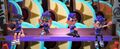 Three Octoling players displayed with Inkling body models when aboard a Splatfest Float
