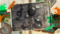 Sunken Scroll 19 from Splatoon 2, featuring a picture of a Salmonid admiring a wall of battle gear. A doodle of a Chum with a Power Egg can be seen.