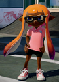 A female Inkling wearing the Shrimp-Pink Polo.