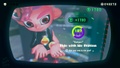 Agent 8 being awarded the Mini Zapfish mem cake upon completing the station.