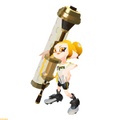 An Octoling Girl holding a Gold Dynamo Roller