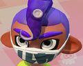 A close look at the King Facemask worn by an Octoling boy.