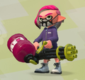 A male Inkling wearing the Firefin Facemask and holding a Heavy Splatling.