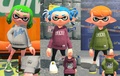The Inkling on the right is wearing the Olive Zekko Parka