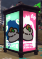 Posters of Marina and Pearl in Arowana Mall with kagami mochi superimposed over their faces.