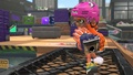 An Inkling holding the Clash Blaster.