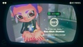 Agent 8 being awarded the Tower mem cake upon completing the station.