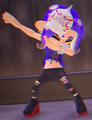 An Octoling performing a Double-Cross Dab while wearing Shiver's amiibo gear set, from the Deep Cut amiibo gear sets' reveal trailer.