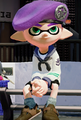 Another male Inkling wearing the Choco Clogs.