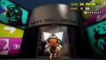 The front of Inkopolis Tower's lobby is labelled in sign script, and the brand on the speakers is written in round script.