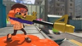 An Octoling aiming a Splat Charger.