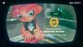 Agent 8 being awarded the Inkling Boy (Blue) mem cake upon completing the station.