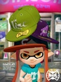 Promo for Skalop, with a female Inkling wearing the Urchins Cap, along with three other Skalop hats.