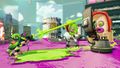 An Inkling shooting a Shielded Octotrooper.