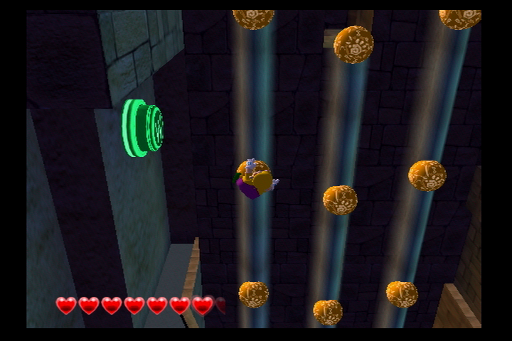 File:Wario World Pecan Sands Green Button.png