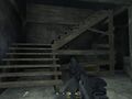 Go up these stairs then camp and clear out the building