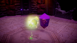 A screenshot of Link being imprisoned in a Crystal as Zelda and Tri warp away.