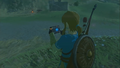 Link holding the Sheikah Slate from Breath of the Wild