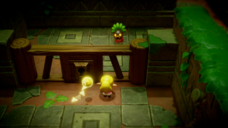 A screenshot of Princess Zelda and Tri inside of a cell in the Deku Scrub Lockup. A Deku Scrub guard looks at them from the other side of the bars.