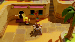 A screenshot of Zelda and Raslett standing outside of her House in Gerudo Town.