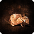 Heavy Rain bronze rat trophy.png