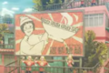 The orange billboard depicting the Ramen Lady promoting ramen for advertisement.