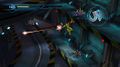 Samus using a Missile while grabbing onto a ledge, portraying various gameplay tactics.