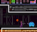 Samus using a Missile on a frozen Metroid in Super Metroid
