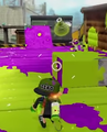Another Inkling boy throwing a Burst Bomb.