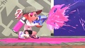 An Inkling girl firing the Glooga Dualies.