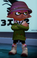 A male Inkling wearing the Snowy Down Boots.